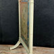 Front of Louis XVI fireplace in laqué wood and fabric has floral decorations