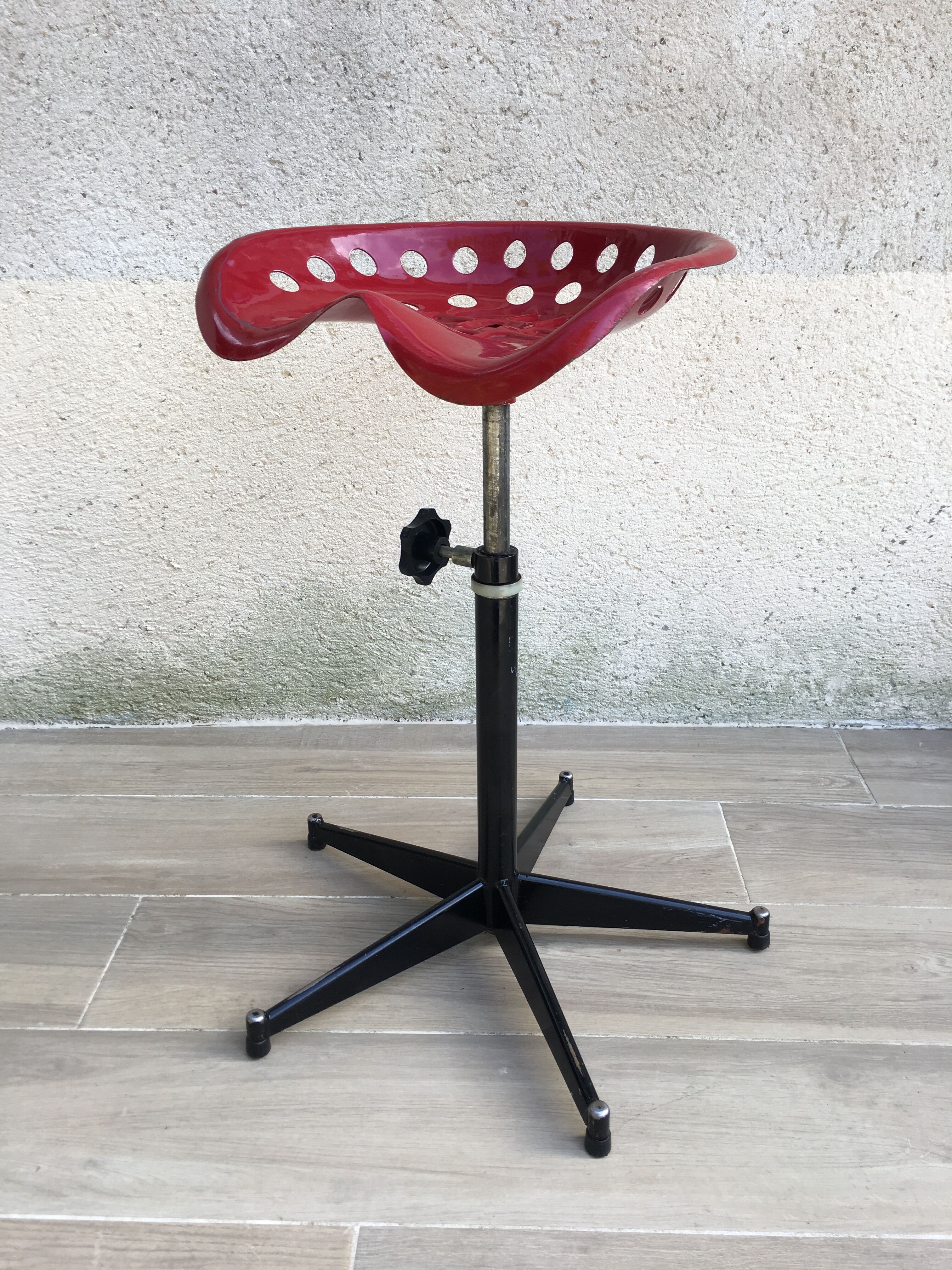 Vintage high stool sitting tractor