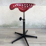 Vintage high stool sitting tractor