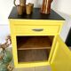 Old yellow vintage jam maker