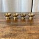 4 small bronze cups