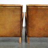 Ensemble de fauteuils en cuir couleur cognac clair de style anglais.