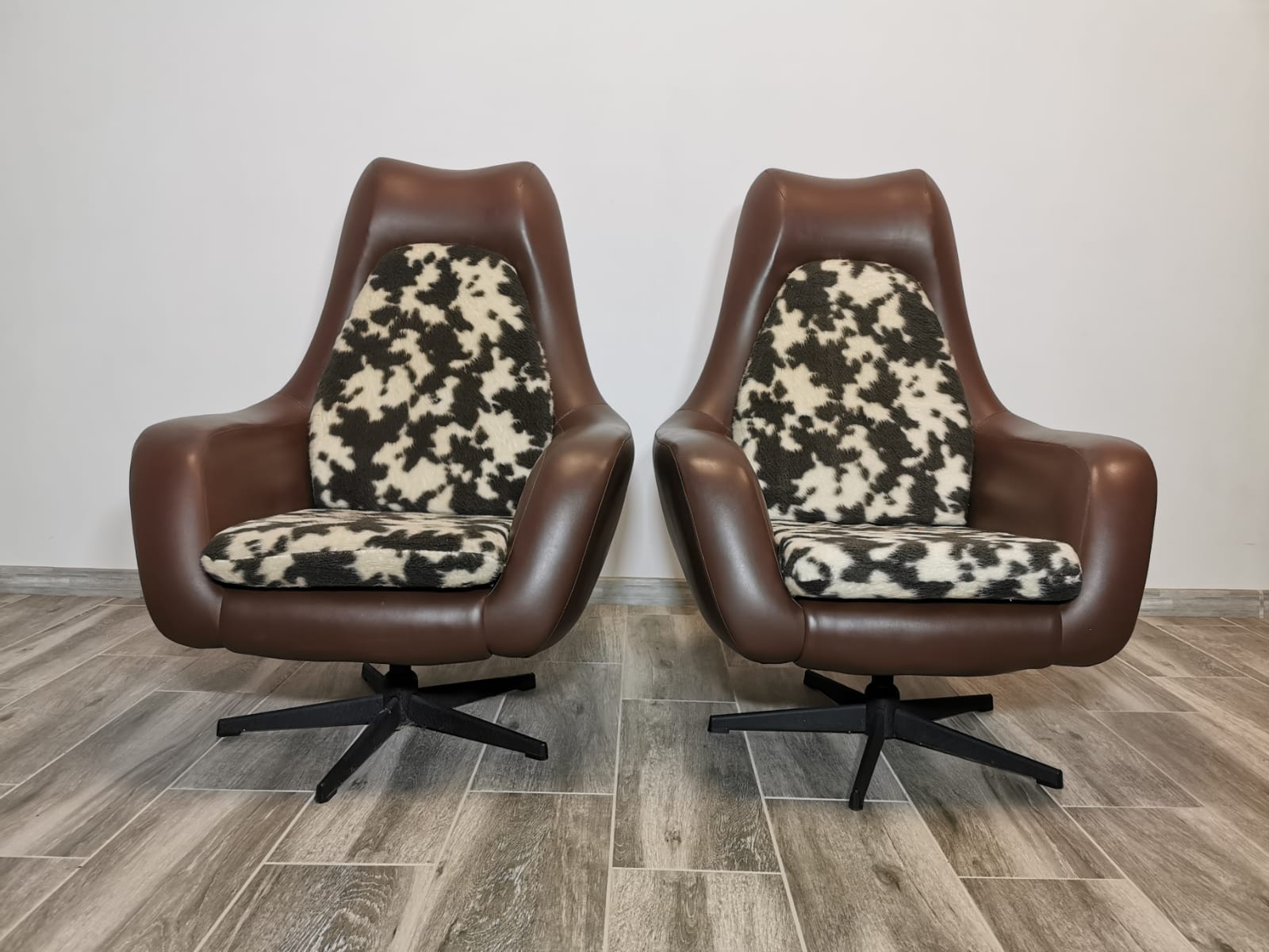 Mid century swivel armchairs