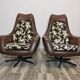 Mid century swivel armchairs