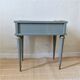 Bedside table with fluted spindle legs