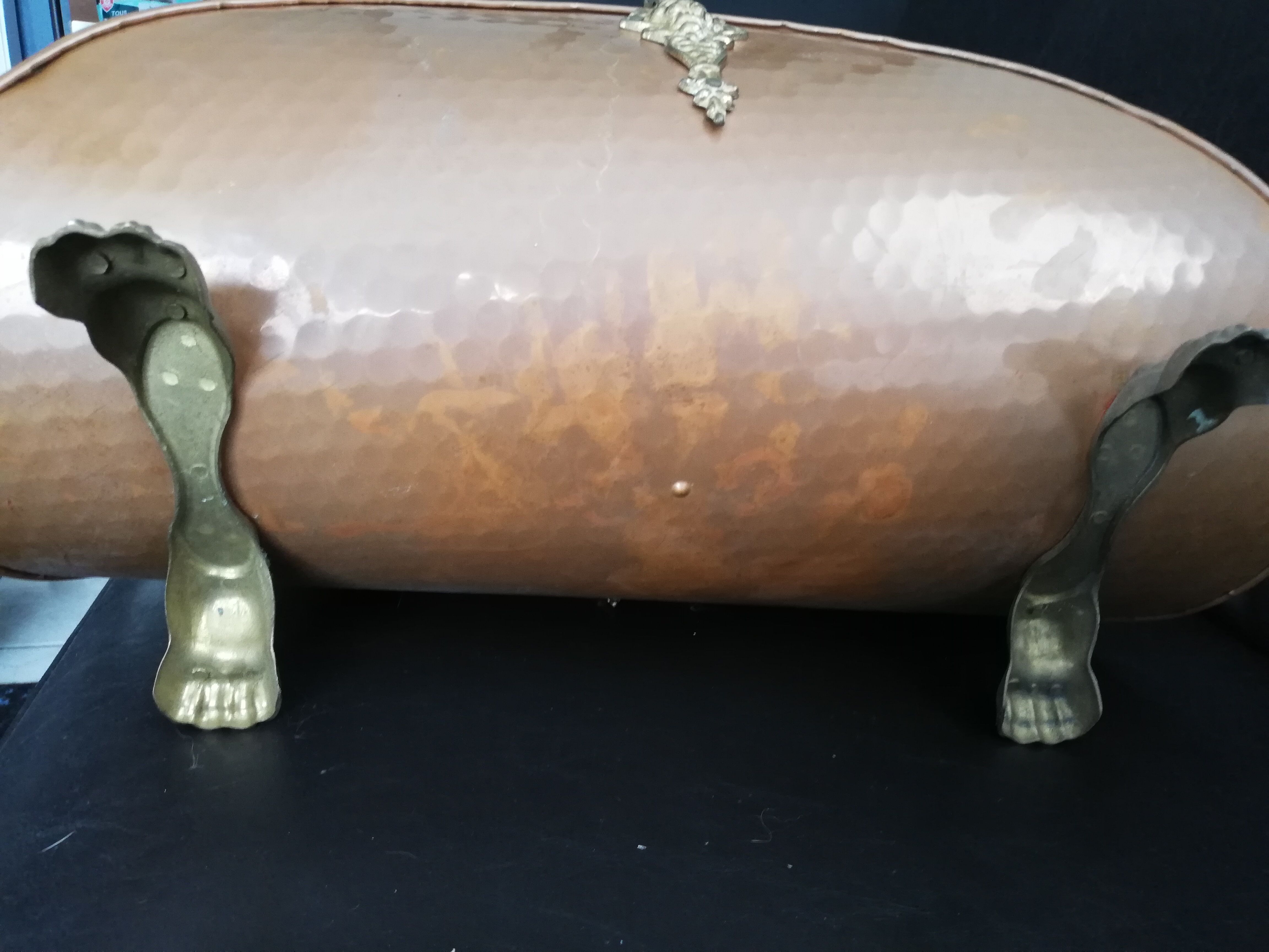 Copper log holder and laison