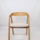 Vintage chairs in light oak and natural linen beige.
