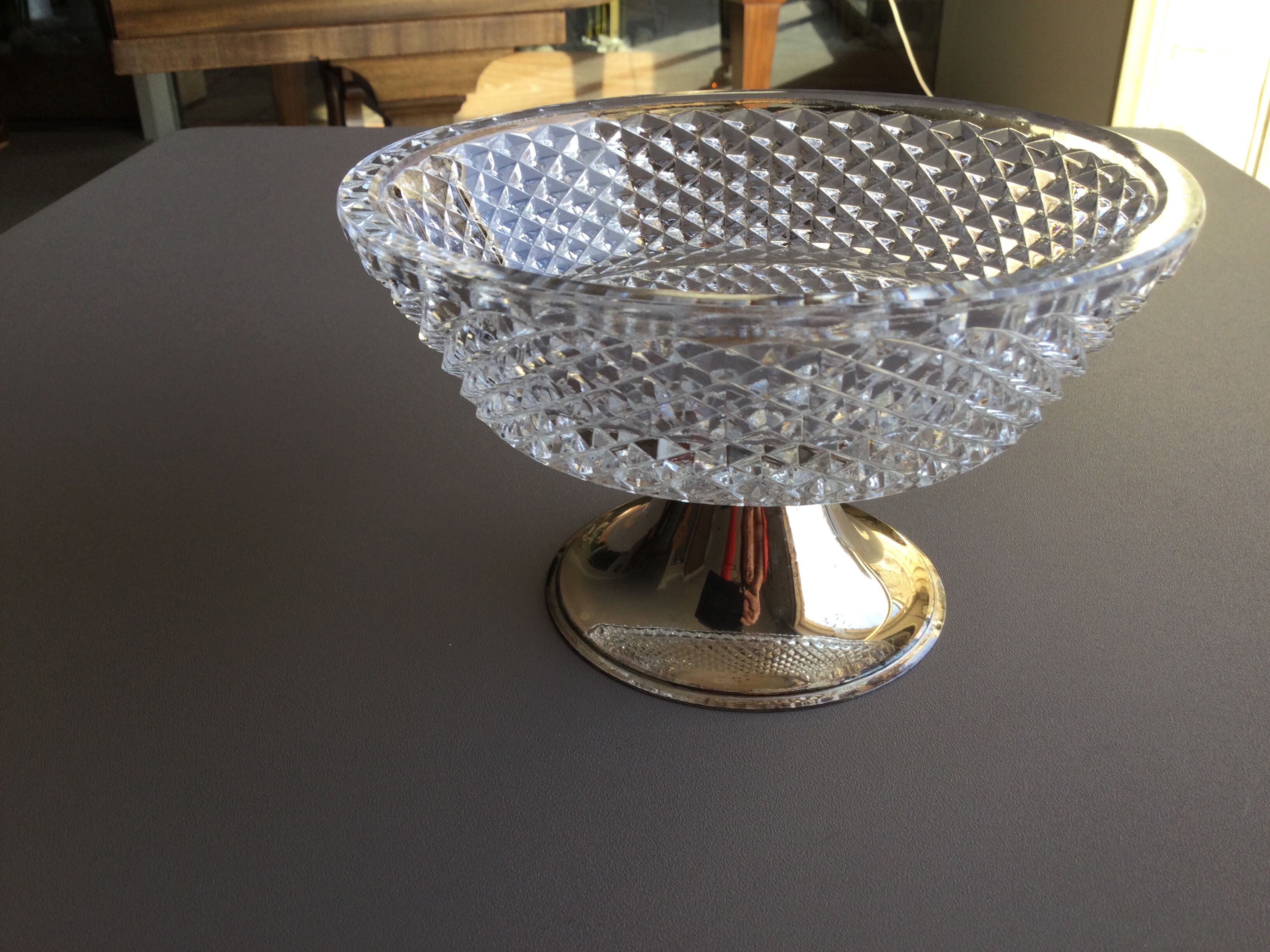 crystal and silver metal display cup