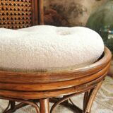 Dark rattan pouf stool with loop cushion