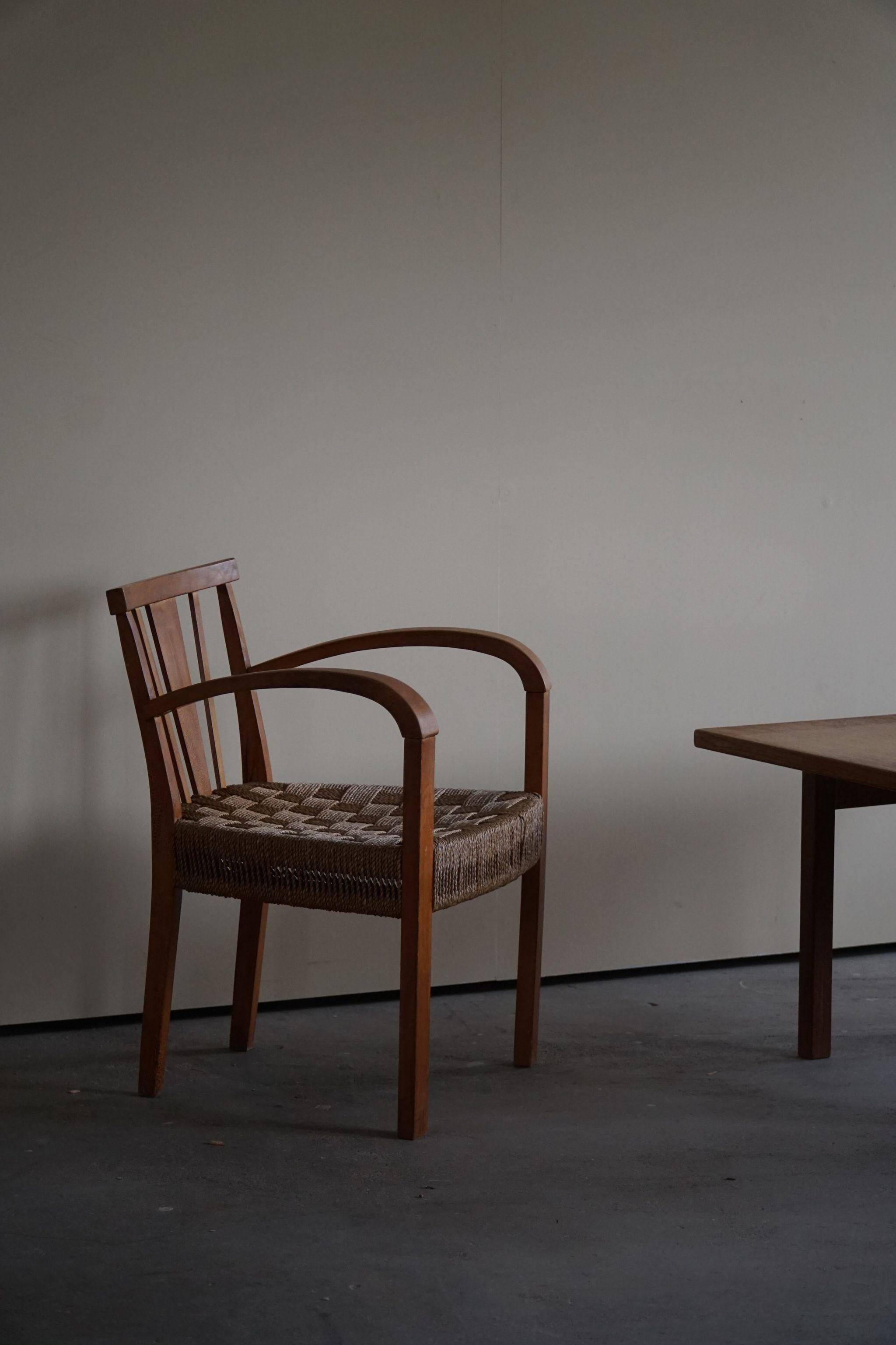 Modern Danish lounge chair in beech and paper cord, in the style of Frits Schlegel.