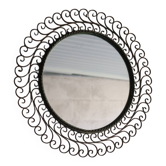 Large round vintage mirror in black metal with green patina