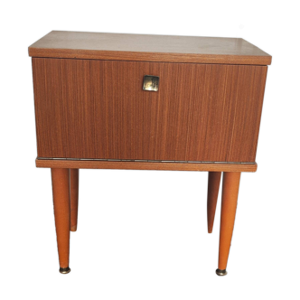 Vintage bedside table from the 70s scandinavian with a flap