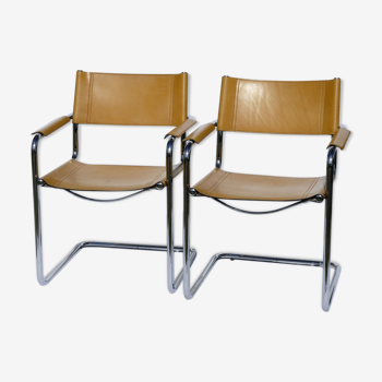Pair of tubular armchairs