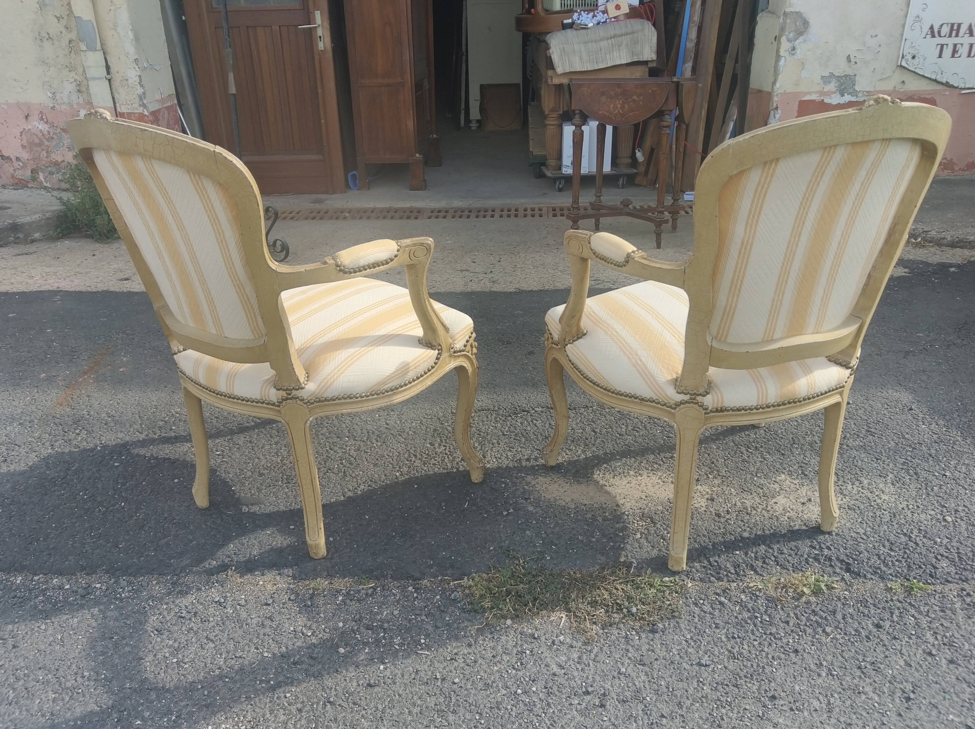 Pair of Louis XV style convertible armchairs
