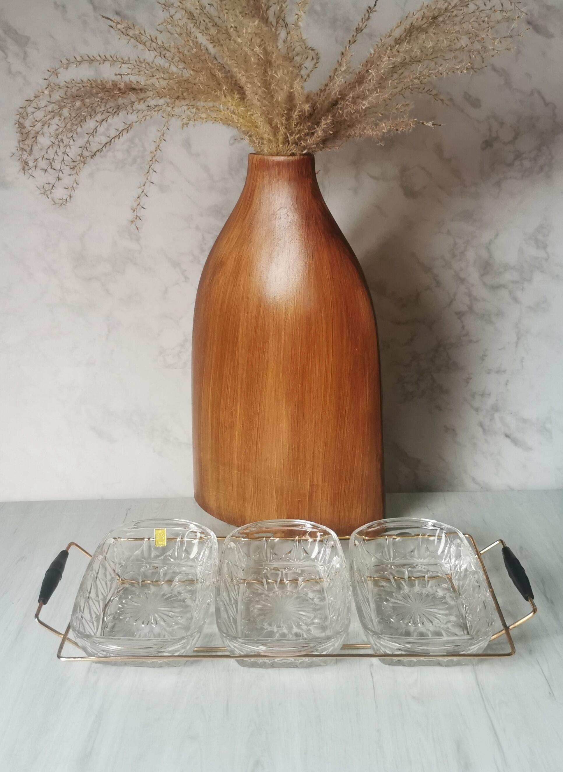 Tray with glass and gold metal compartments