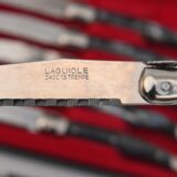 6 knives and silver metal knife holder