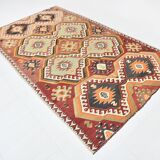 Tapis kilim vintage géométrique fait main – Explosion de motifs ethniques