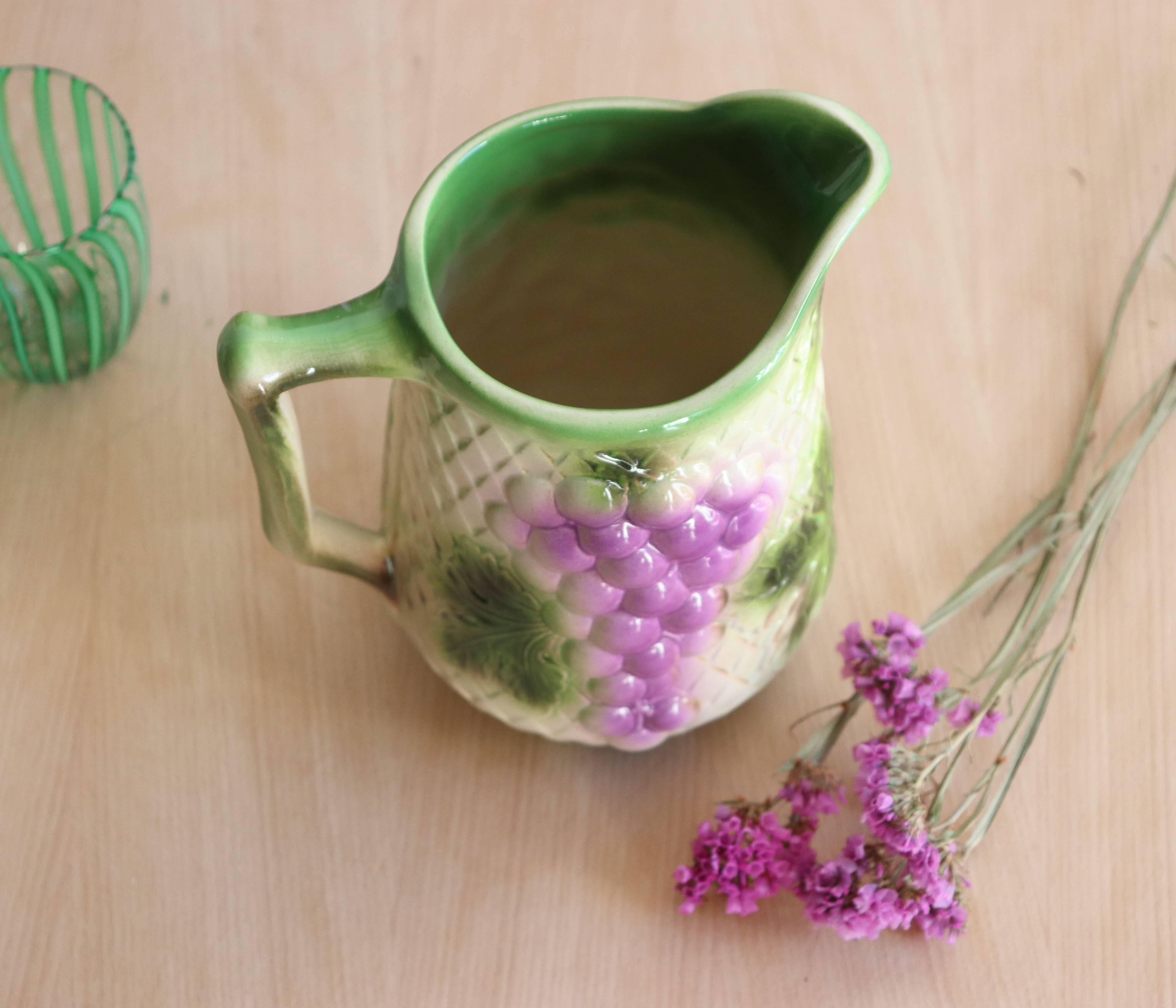 Barbotine pitcher from the 20s/30s with vine and grape decoration, Saint-Clément earthenware factory