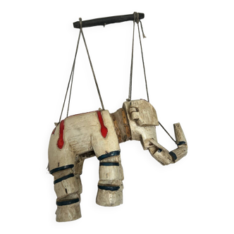 Old wooden elephant puppet