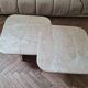 Pair of travertine nesting tables