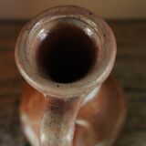 Small vintage marbled stoneware candlestick with handle