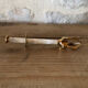Sugar or ice tongs in their case
