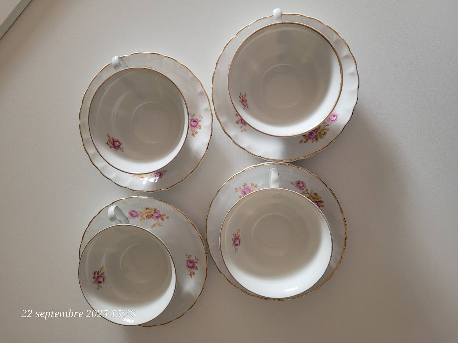 4 antique cups and saucers