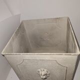 Square planter with patinated iron lion heads