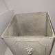 Square planter with patinated iron lion heads