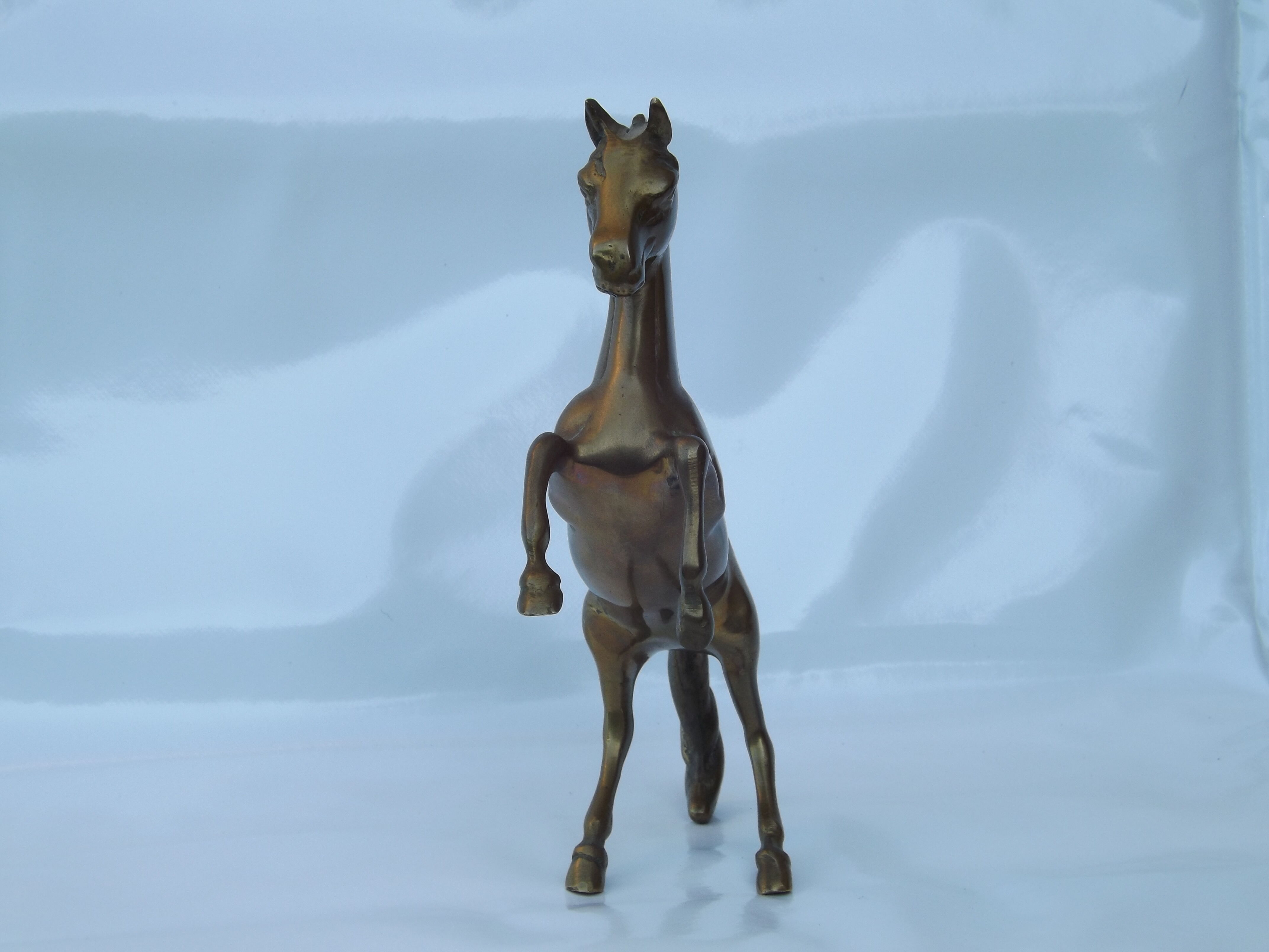Golden bronze horse