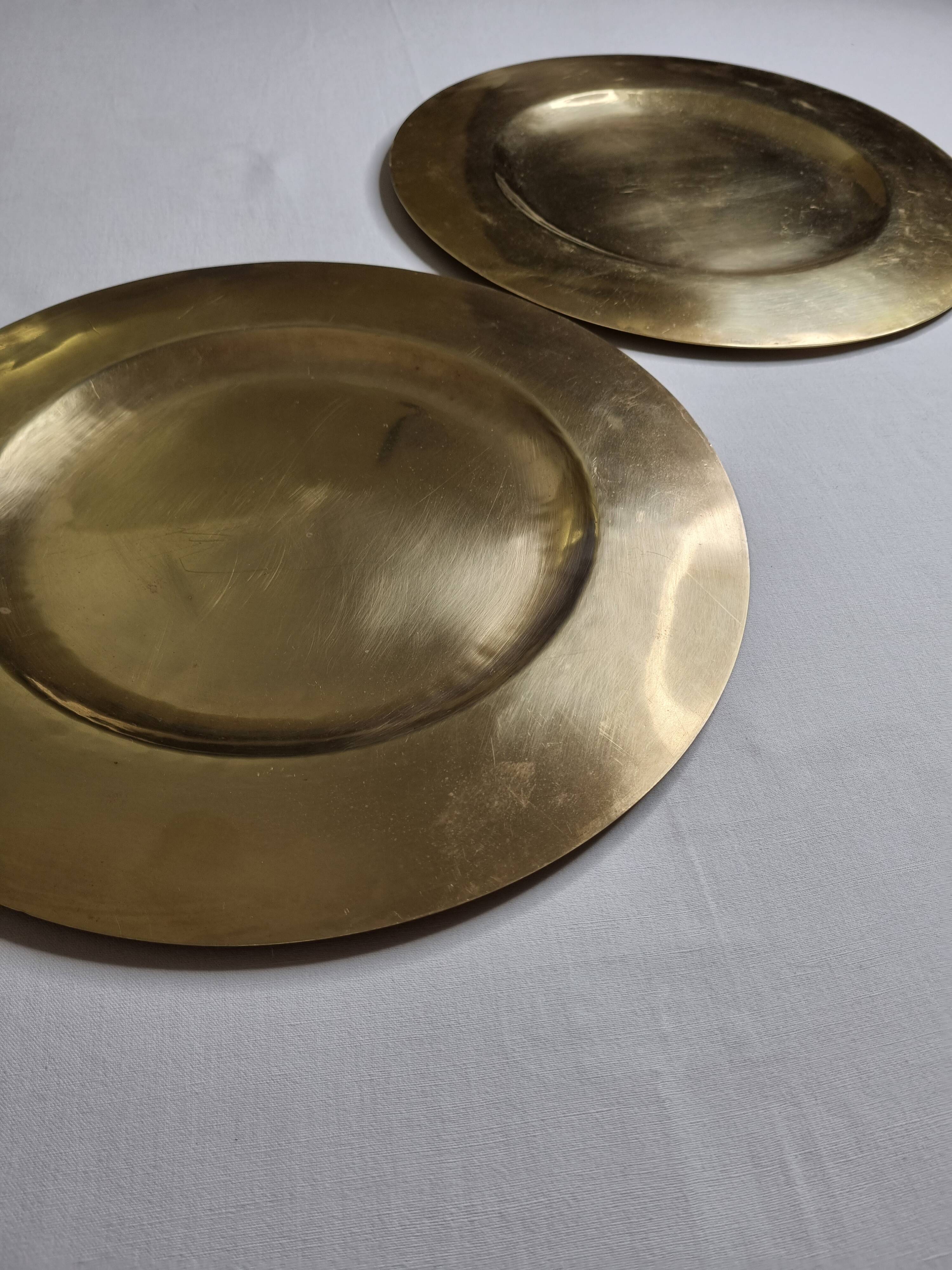 Two dishes in solid brass, 35 cm