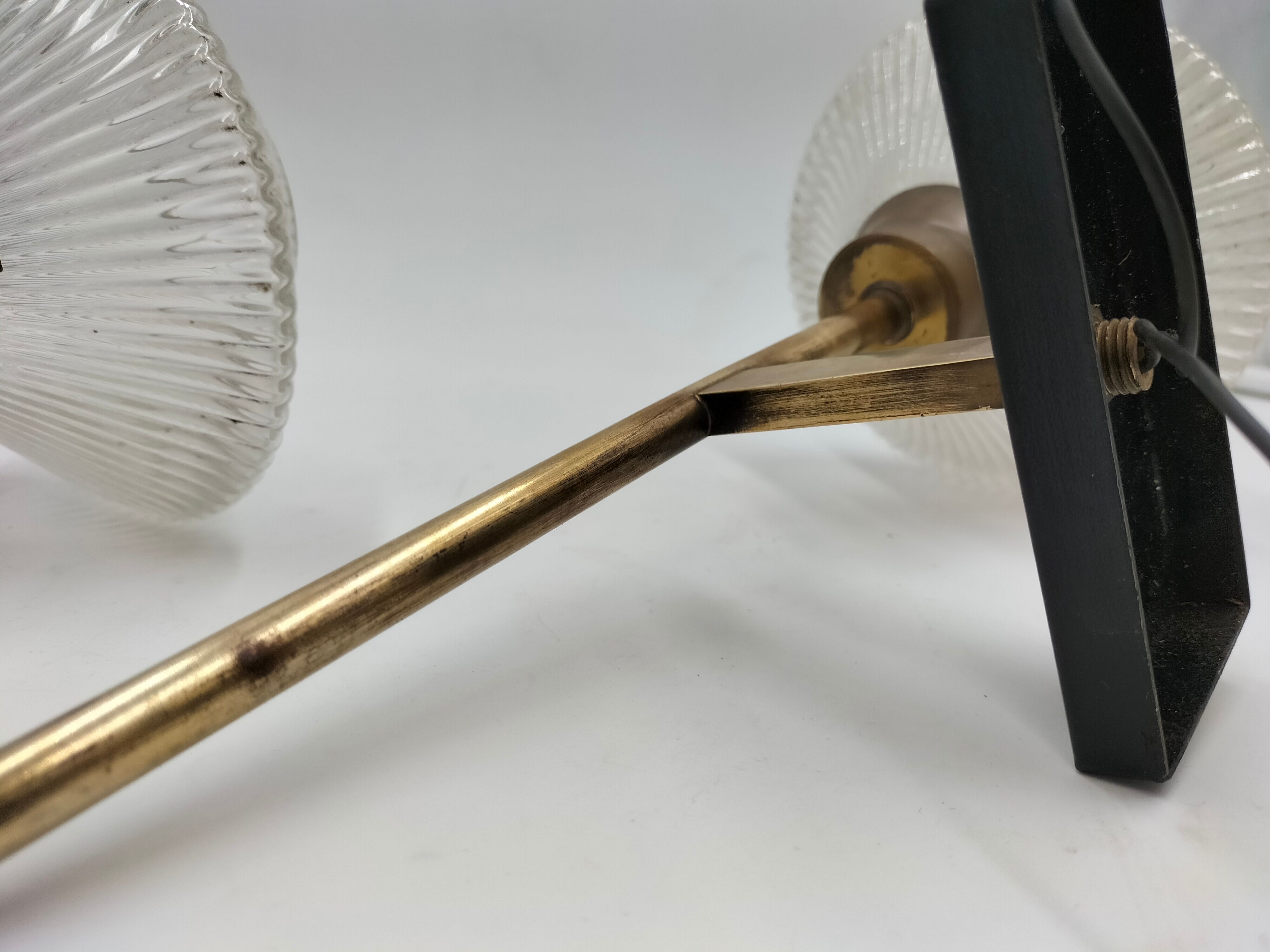 Pair of brass and glass wall lamps