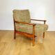Wooden vintage brown armchair, olive green, long pile on removable cushions