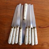 Set of 9 vintage cream table knives