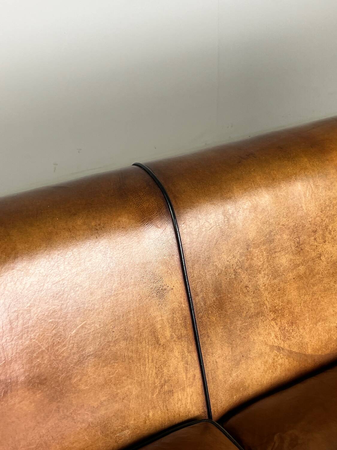 Art deco sofa sheep’s leather