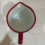 Pitcher in red enamelled sheet metal