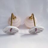 Swan neck and glass globe wall lights