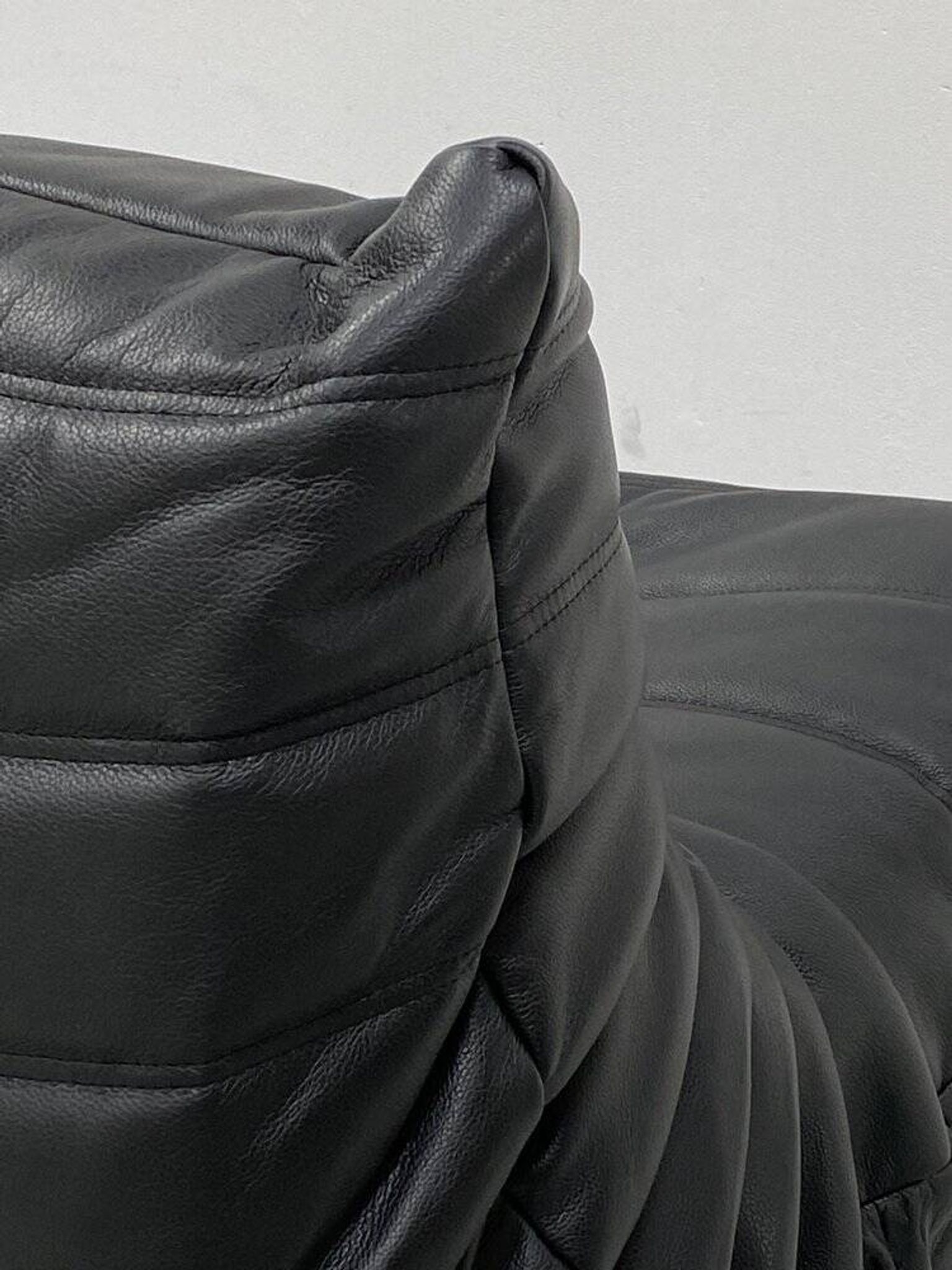 Togo lounge chairs in black leather attributed to Michel Ducaroy for Ligne Roset, set of 2