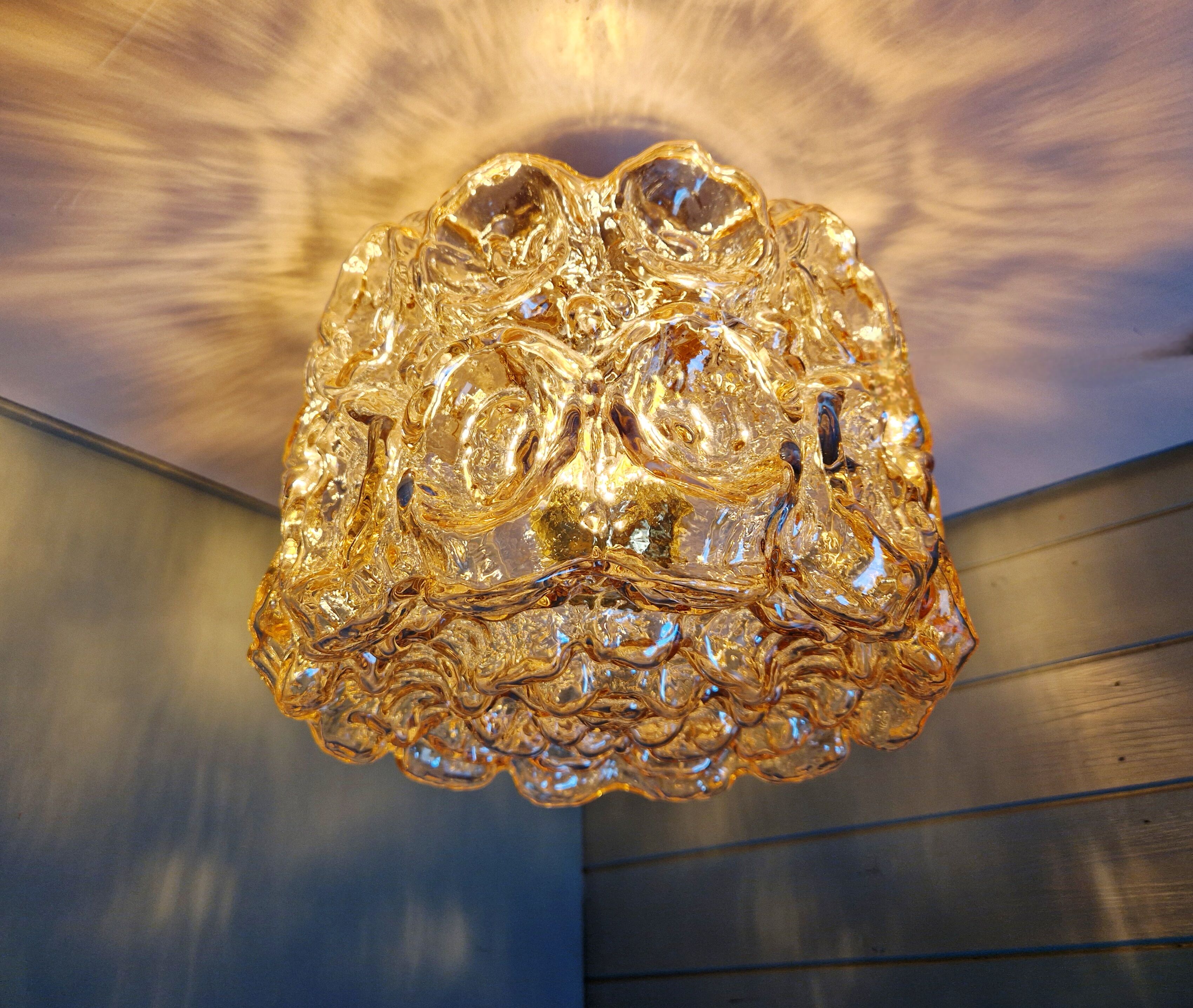 Brass and amber textured glass ceiling light, design by Helena Tynell, Limburg.