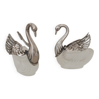 Two frosted glass swan salt cellars with silver plating.
