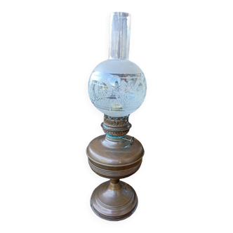 Old engraved globe oil lamp