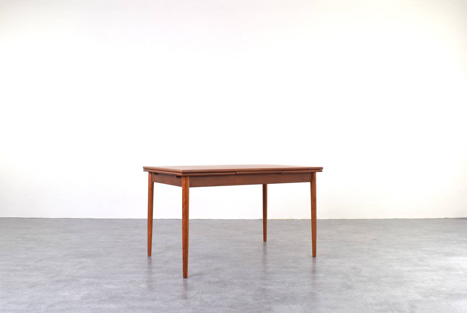 Mid-century Danish teak extendable dining table, 1960s.