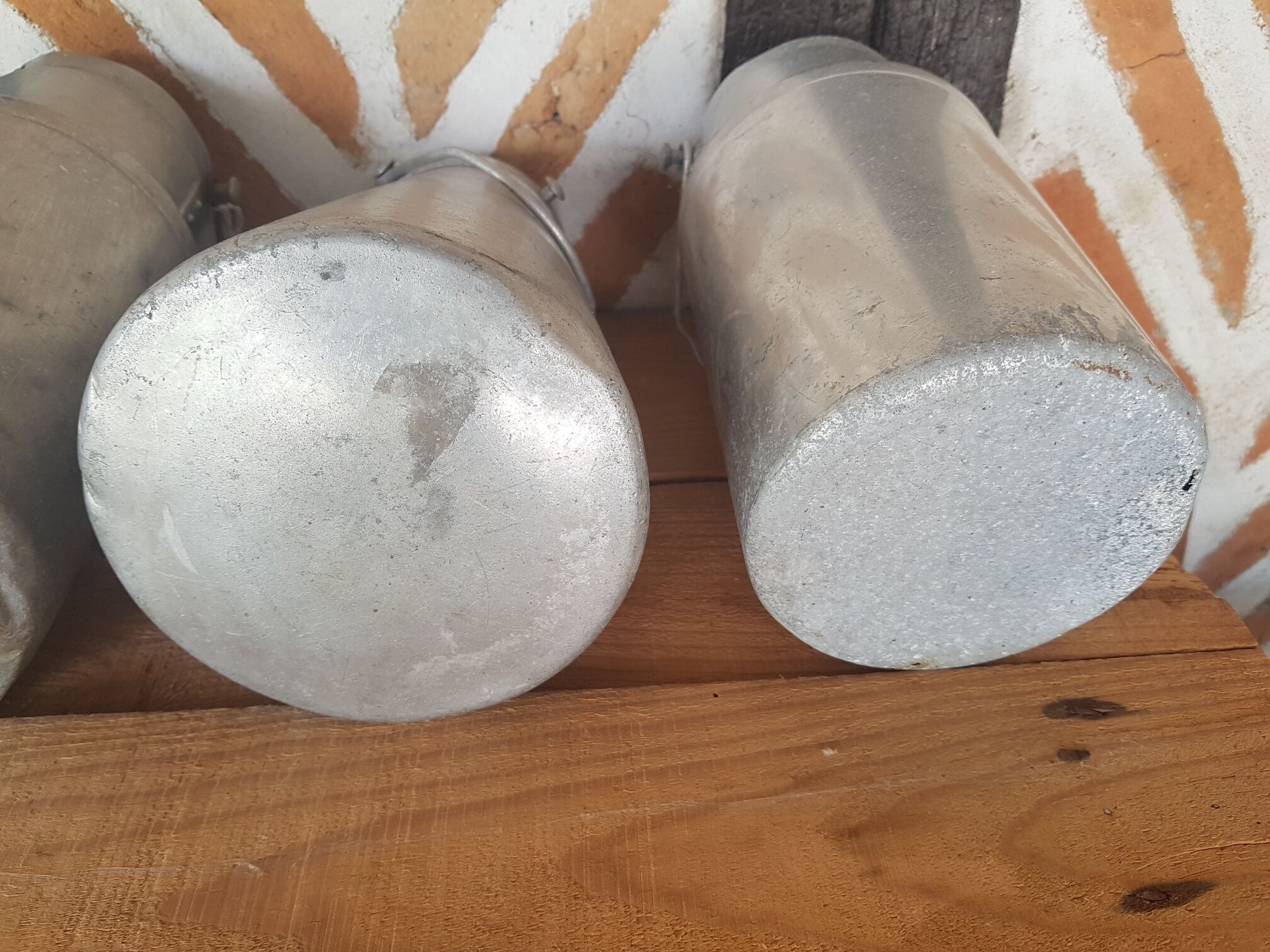 Set of 4 old metal milk canister jars