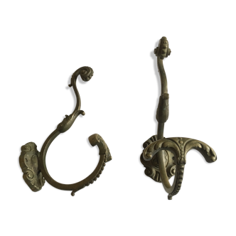 Pair of bronze coat-hangers in patinated 1900s