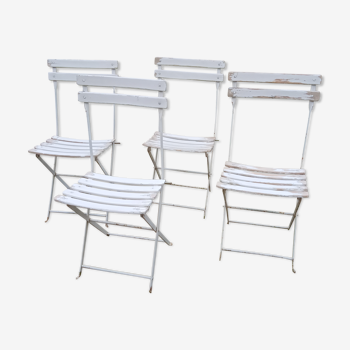 Quatre chaises de jardin anciennes