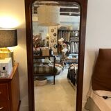 Beveled mirror with wooden contours