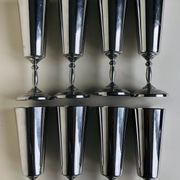 Set of eight silver metal flutes