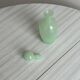 Opaque light green glass vial