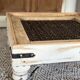 Table basse en bois et acier tressé – Double usage décoratif