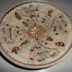Hand decorated terracotta plate